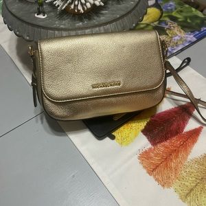 Authentic Gold MK purse only used once